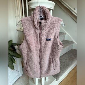 Blush vest purchased and never worn. Runs small.